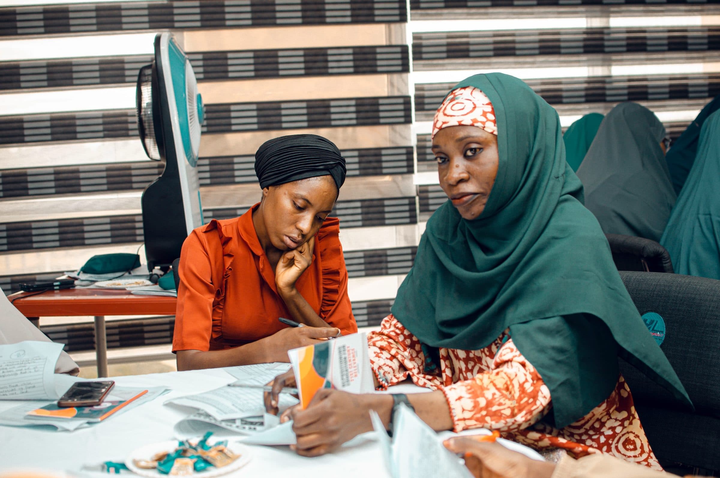 Teachers working through a programme exercise