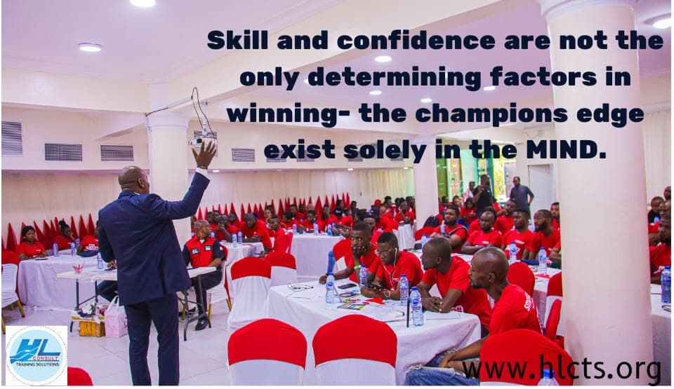 Airtel staff in red uniforms attending an HL Consult training session